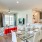 a large kitchen with a dining table
