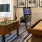 foosball, shuffleboard table and ping pong machine in game room