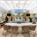 covered poolside patio wih kitchen, billiards table and couches
