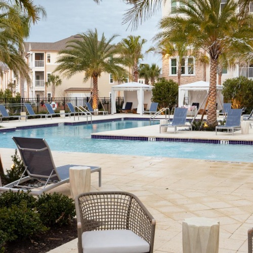 Take advantage of all Pier 8 at The Preserve has to offer a pool with chairs around it
